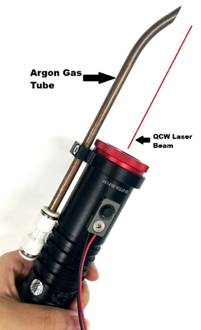 QCW laser handheld torch with Argon gas tube and laser beam labeled